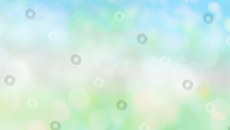 Скачать Размытый весенне-летний абстрактный фон с подсветкой боке. Естественный размытый утренний пейзаж с расфокусированными солнечными лучами на сине-зеленом фоне. фотосток Ozero