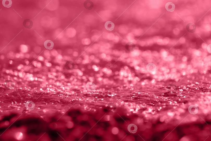 Скачать Абстрактный размытый фон ярко-пурпурного цвета с блестками, расфокусированный свет. фотосток Ozero