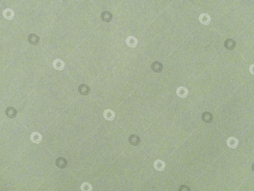 Скачать Светло-зеленый бумажный материал, похожий на мрамор, с текстурой для фона. фотосток Ozero