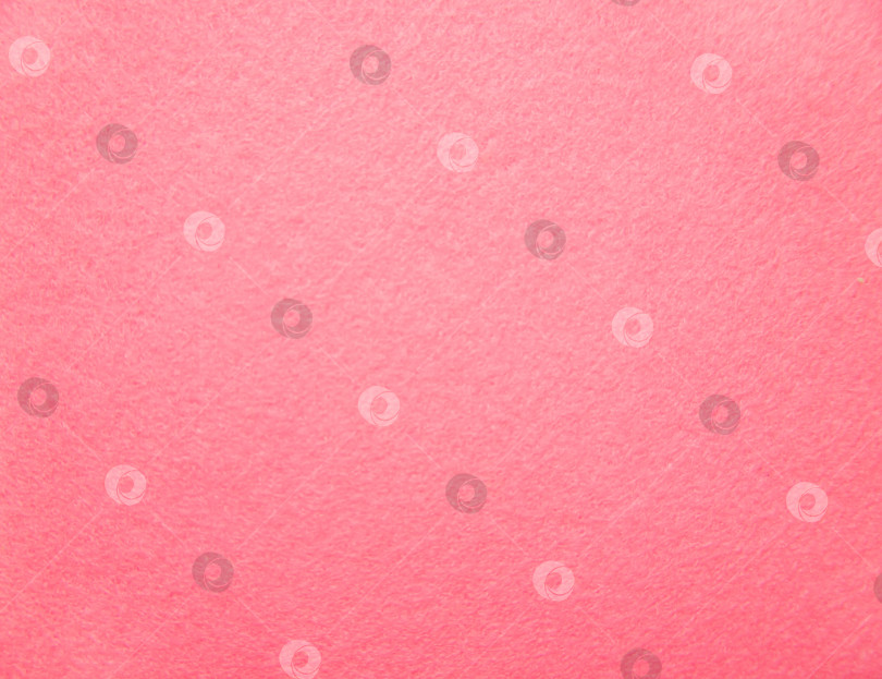 Скачать Розовая фетровая ткань крупным планом. Абстрактный фон. Текстура волокон. Бархатная поверхность. фотосток Ozero