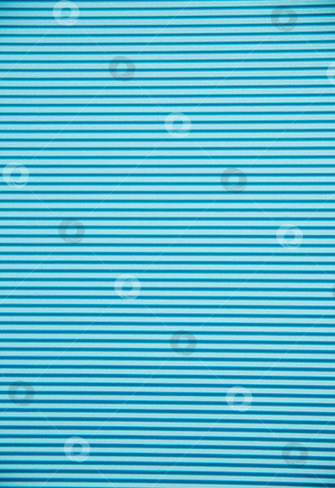 Скачать Абстрактный фон из гофрированной бумаги для нанесения синим цветом. Пространство для текста. Текстура. Горизонтальные полосы. фотосток Ozero