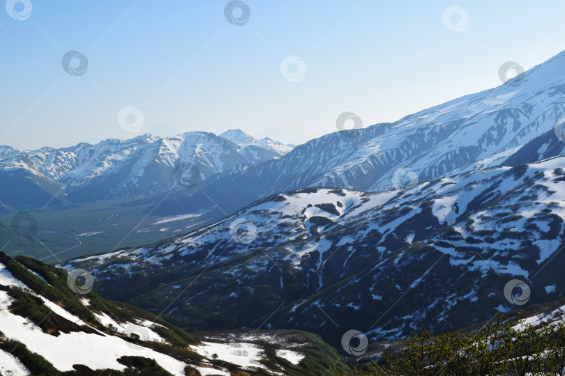 Скачать снежные вулканы на Камчатке, заснеженные горы фотосток Ozero