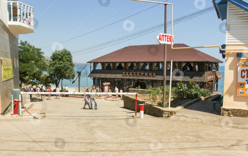 Скачать Ресторан на открытом воздухе на пляже. фотосток Ozero