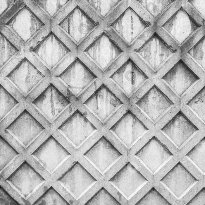 Скачать ромбовидный фон. Абстрактный геометрический фон из бетона. фотосток Ozero