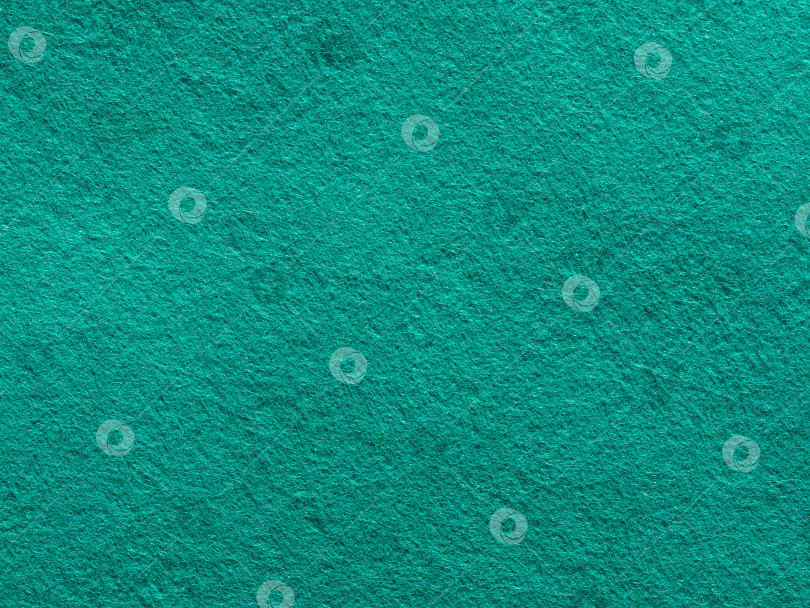 Скачать текстурированный аквамариновый фон из синтетического волокна. Крупный план фотосток Ozero