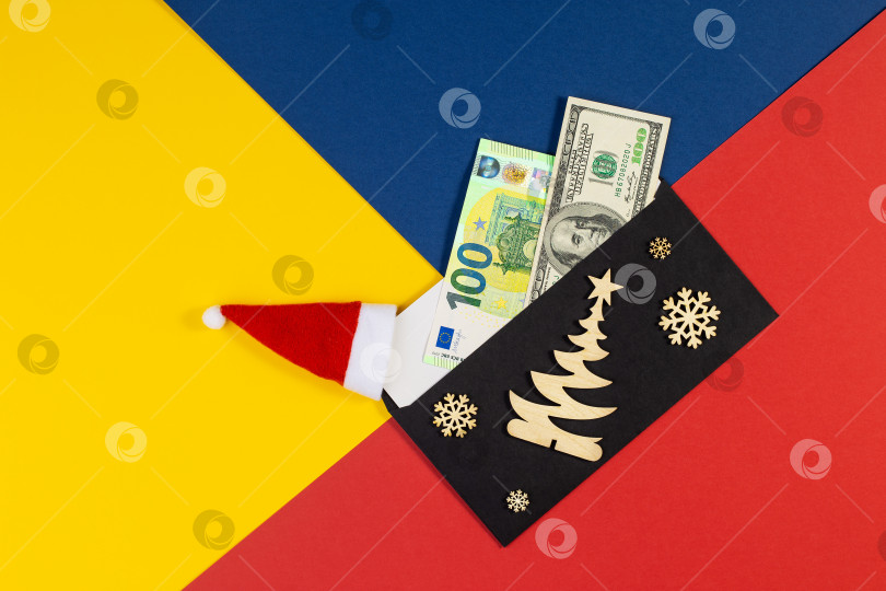 Скачать Геометрическая креативная рождественская плоская шкатулка с рождественским денежным подарком. фотосток Ozero