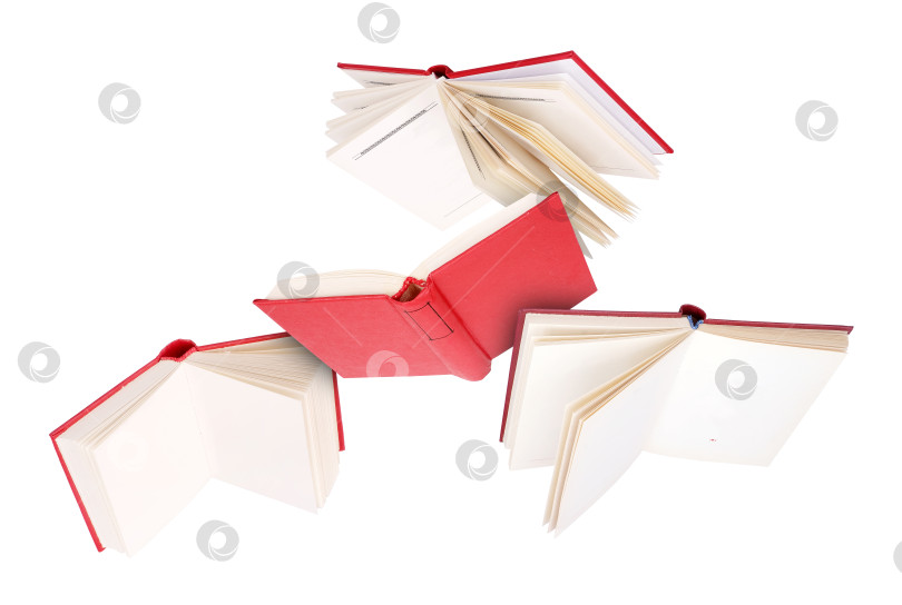 Скачать Летающие красные книги, выделенные на белом фоне фотосток Ozero