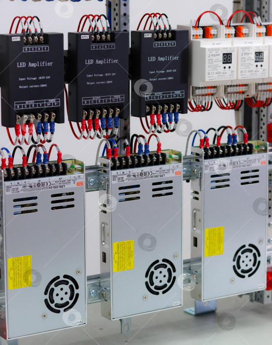 Скачать Power modules for LED strips installed in an electrical switchboard. фотосток Ozero