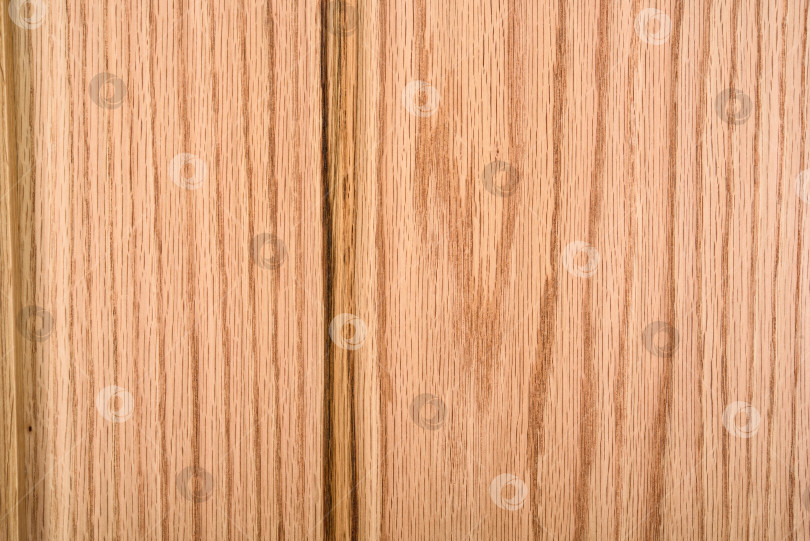 Скачать Brown Beige Texture of stained oak wood with grain, fragment of a wooden panel hardwood. surface bark is used as natural background, web page, board, table. Contrasts and symmetries. Space for text. фотосток Ozero