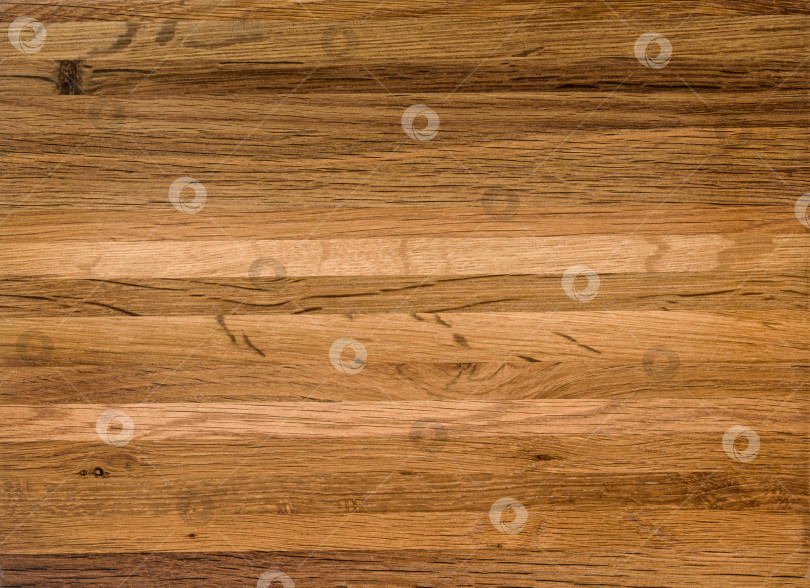 Скачать Brown Beige Texture of stained oak wood with grain, fragment of a wooden panel hardwood. surface bark is used as natural background, web page, board, table. Contrasts and symmetries. Space for text. фотосток Ozero