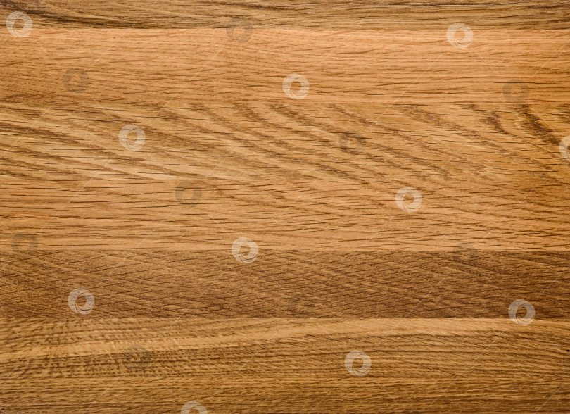 Скачать Brown Beige Texture of stained oak wood with grain, fragment of a wooden panel hardwood. surface bark is used as natural background, web page, board, table. Contrasts and symmetries. Space for text. фотосток Ozero