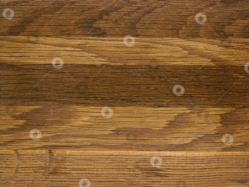 Скачать Brown Beige Texture of stained oak wood with grain, fragment of a wooden panel hardwood. surface bark is used as natural background, web page, board, table. Contrasts and symmetries. Space for text. фотосток Ozero