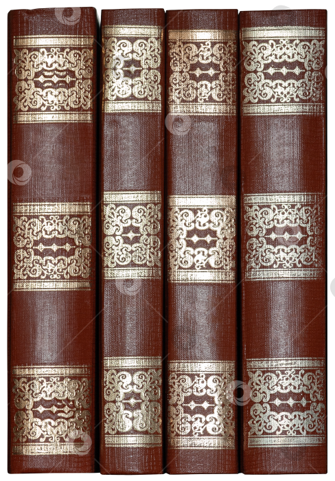 Скачать A row of antique leather books with gilded pattern, isolated on a white background фотосток Ozero