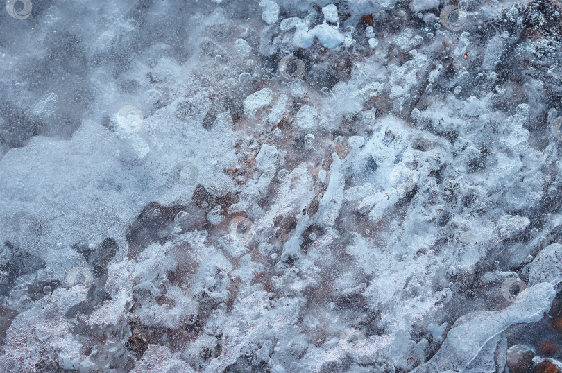 Скачать Текстурный фон поверхности речного прибрежного льда крупным планом. фотосток Ozero