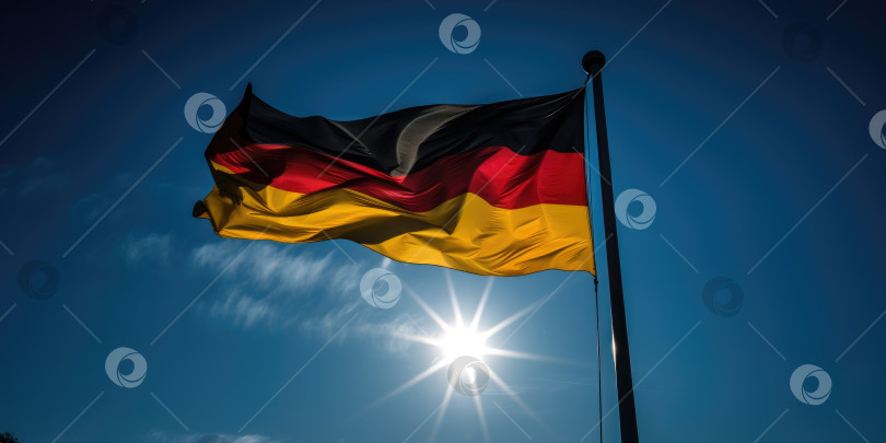 Скачать Немецкий флаг на фоне голубого неба. Порождающий искусственный интеллект фотосток Ozero