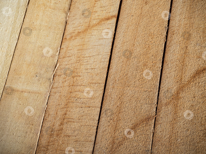 Скачать Фон сделан из деревянных досок. Светло-коричневый деревянный настил в качестве фона фотосток Ozero