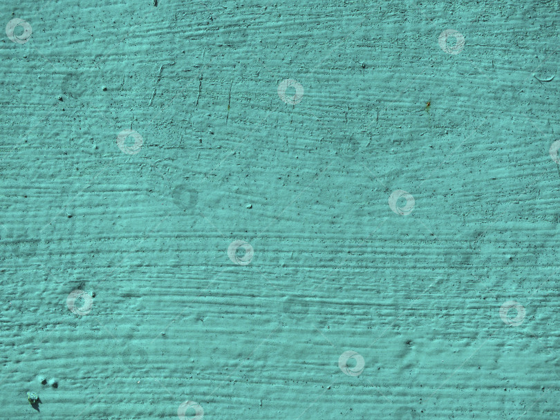 Скачать Абстрактный текстурированный бирюзовый фон. Шероховатая окрашенная поверхность сине-зеленого (аквамаринового) цвета фотосток Ozero