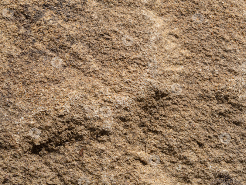 Скачать Естественная текстура зернистой поверхности каменного фона. Текстура песчаника для фона фотосток Ozero