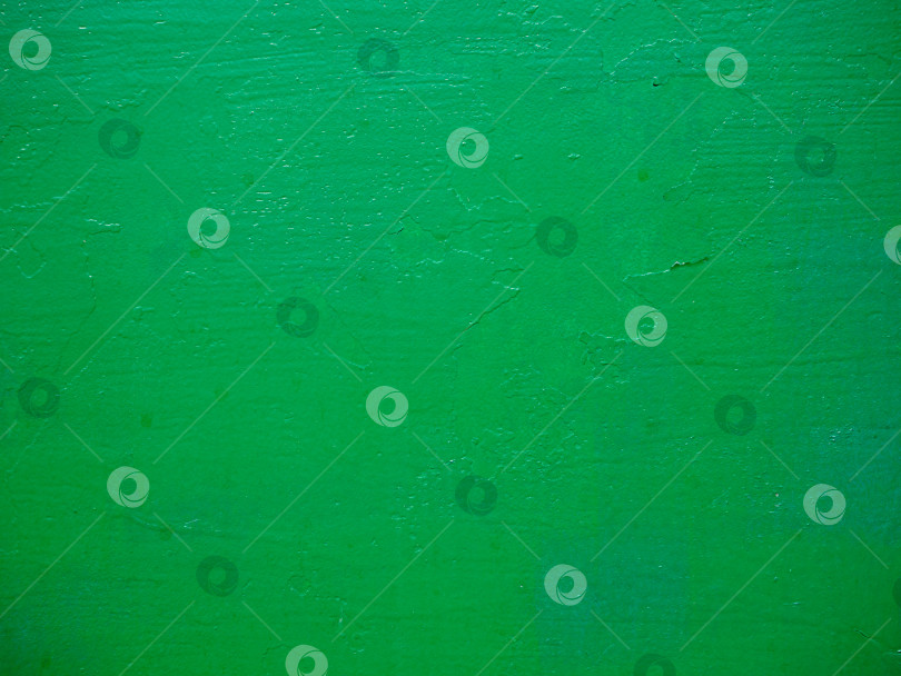 Скачать Текстура зеленого фона. Шероховатая поверхность, окрашенная зеленой краской фотосток Ozero