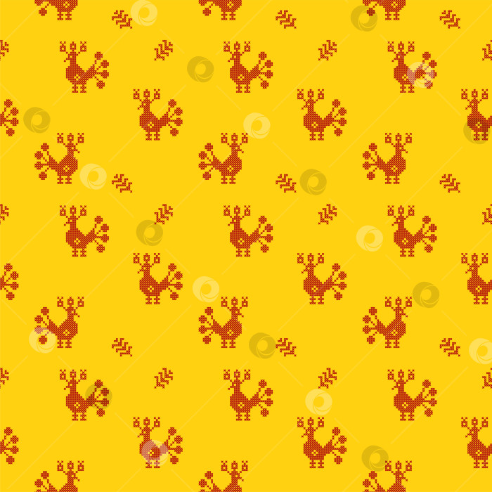 Скачать Бесшовный желтый фон в народном стиле с вышитыми крестиком птицами и перьями фотосток Ozero