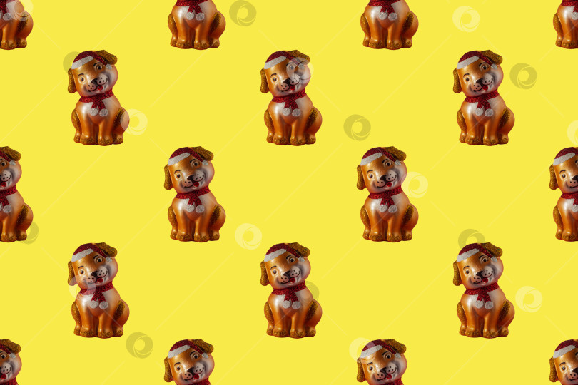 Скачать Абстрактный детский бесшовный фон с собаками. Множество красивых игрушечных собачек на желтом фоне фотосток Ozero