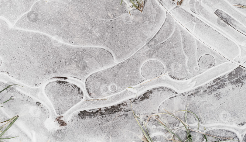 Скачать Замерзшая вода в лужах фотосток Ozero