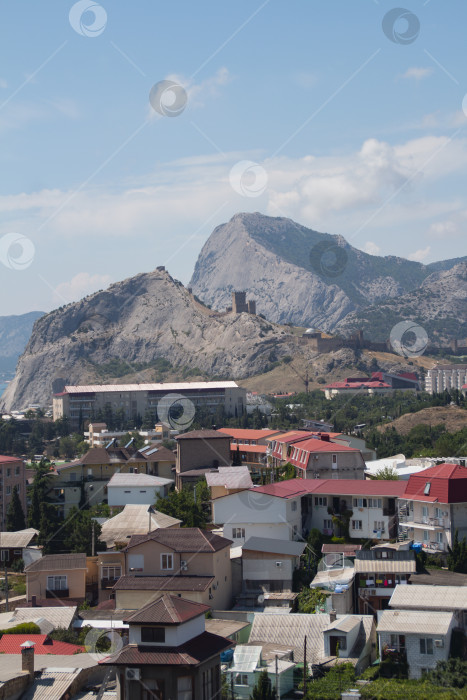 Скачать Дома в Крыму на бегу моря с горами фотосток Ozero