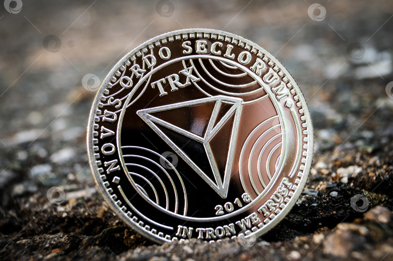 Скачать Tron TRX - это современный способ обмена, и эта криптовалюта является удобным платежным средством на финансовом и веб-рынке фотосток Ozero