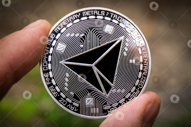 Скачать Tron TRX - это современный способ обмена, и эта криптовалюта является удобным платежным средством на финансовом и веб-рынке фотосток Ozero