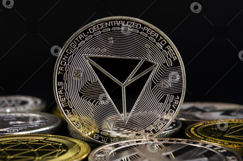 Скачать Tron TRX - это современный способ обмена, и эта криптовалюта является удобным платежным средством на финансовом и веб-рынке фотосток Ozero