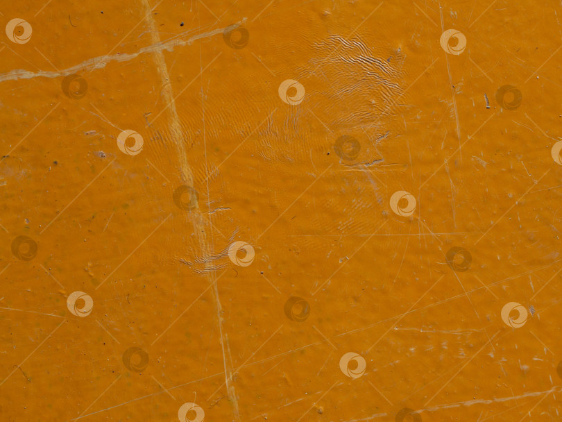 Скачать Текстура деревянного пола, выкрашенного оранжевой краской. Крупный план поверхности пола с царапинами, потертостями и мелким мусором фотосток Ozero