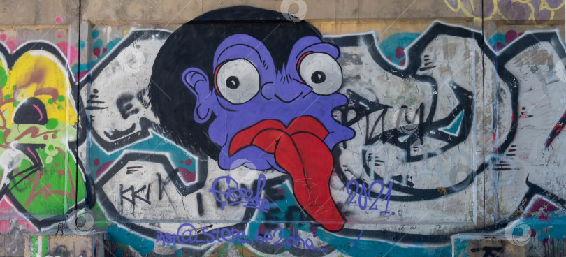 Скачать Красивое уличное искусство граффити. Абстрактный творческий рисунок на стенах города. Современная городская культура фотосток Ozero