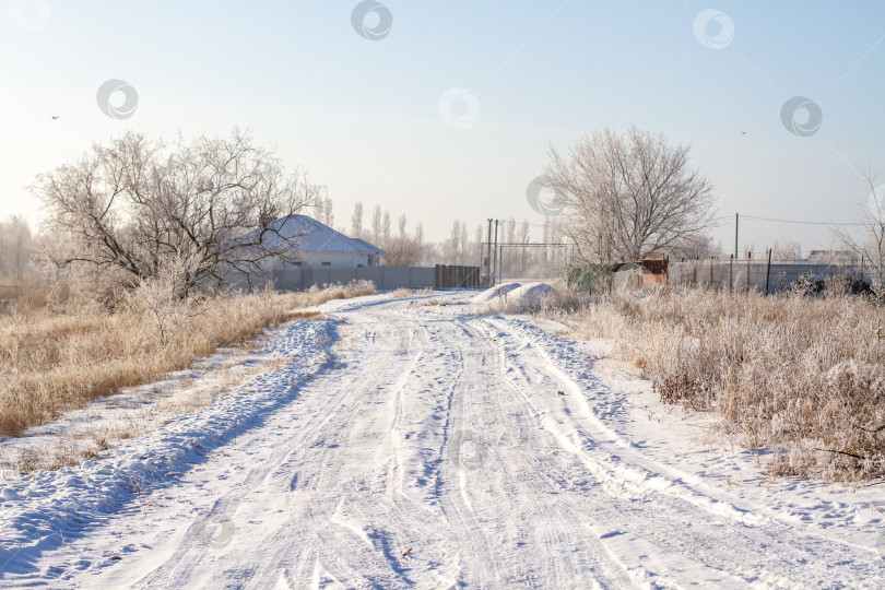 Скачать Дорога зимой в деревне. фотосток Ozero