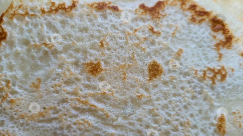 Скачать Текстура тонкого традиционного свежеиспеченного домашнего восточного хлеба. фотосток Ozero