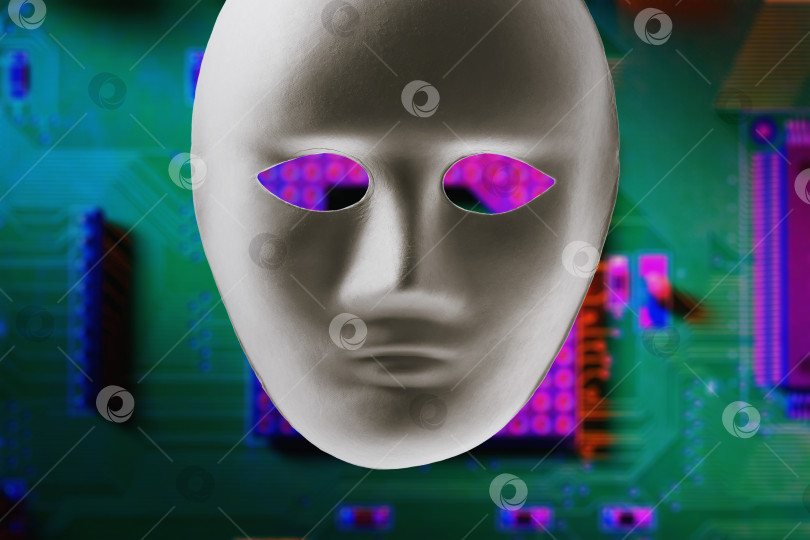 Скачать Бумажная маска на фоне материнской платы компьютера. Концепция на тему анонимного взлома компьютерных систем фотосток Ozero