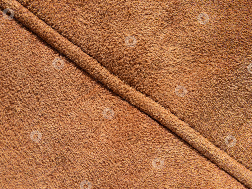 Скачать фоновый текстурный узор из натуральной потертой коричневой замши фотосток Ozero