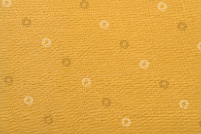 Скачать Желтый фон с абстрактным плетеным узором. Дизайн текстуры декоративного материала крупным планом фотосток Ozero