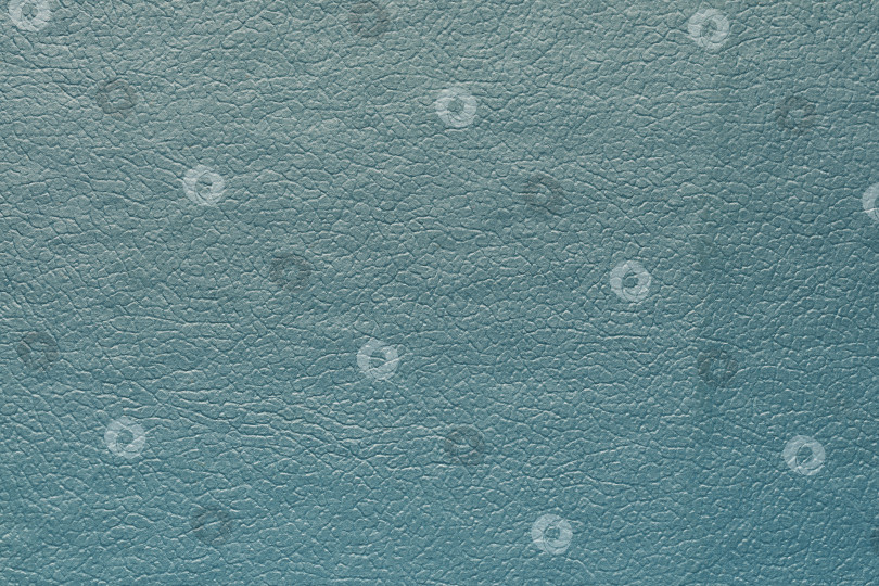 Скачать Синтетическая синяя кожа для фона. Декоративный материал с текстурой крупным планом фотосток Ozero