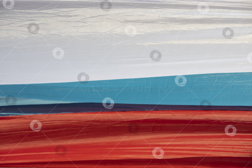 Скачать Ткань флага России. Детали из канвы трех цветов. фотосток Ozero