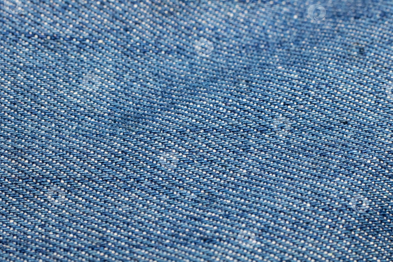Скачать Синяя джинсовая ткань крупным планом, фон или текстура фотосток Ozero
