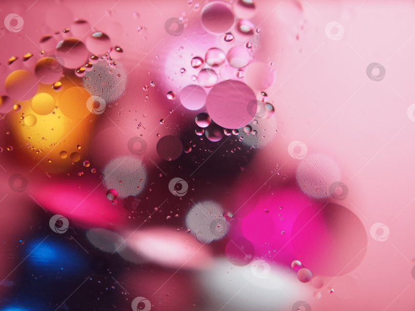 Скачать Разноцветные круги на розовом фоне. фотосток Ozero