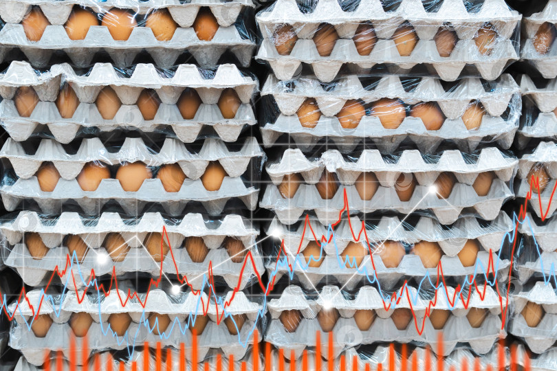 Скачать Яйца на фоне супермаркета. Графики. Цены на продукты питания выросли. Концепция инфляции. розничная торговля. фотосток Ozero