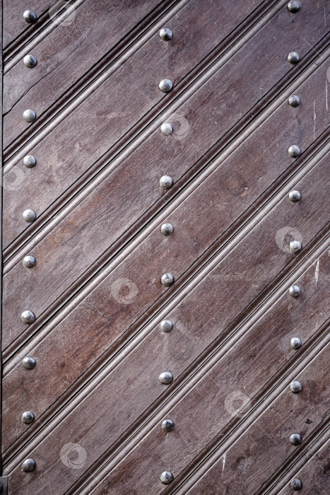 Скачать Старая поверхность из диагональных деревянных планок с металлическими заклепками фотосток Ozero