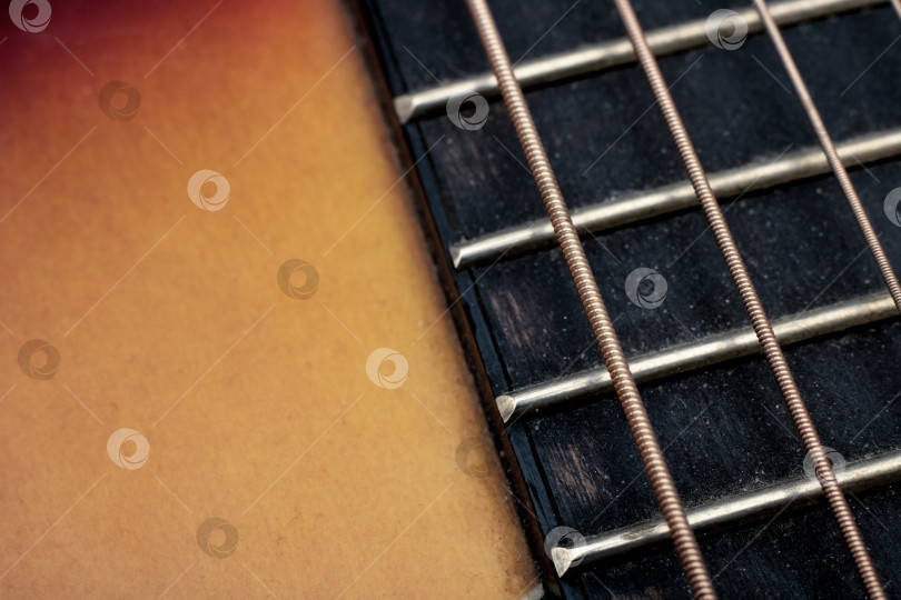 Скачать Гитарные струны закрываются пространством для копирования фотосток Ozero