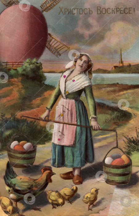 Скачать Деревенская девушка с пасхальными яйцами в деревянных ведрах. Скан со старинной открытки. фотосток Ozero