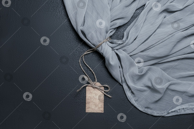 Скачать Текстурное изображение текстильного материала с биркой фотосток Ozero