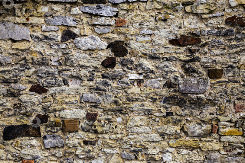 Скачать Старые бесформенные камни создают текстуру каменной облицовки фотосток Ozero
