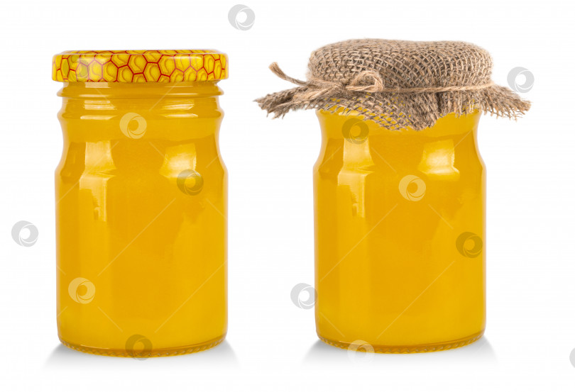 Скачать баночка с медом, выделенная на белом фоне фотосток Ozero