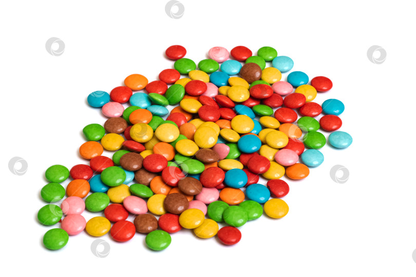 Скачать Стопка разноцветных конфет, выделенных на белом фоне фотосток Ozero