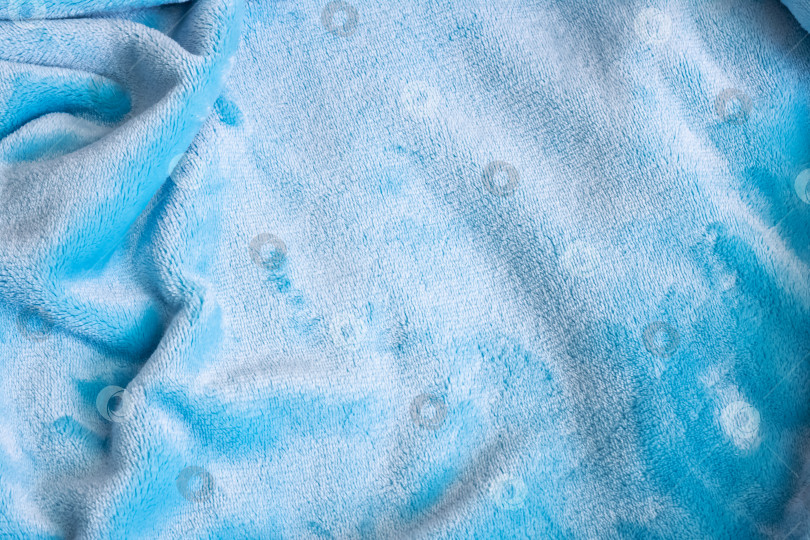 Скачать Складки на синей бархатной ткани крупным планом фотосток Ozero